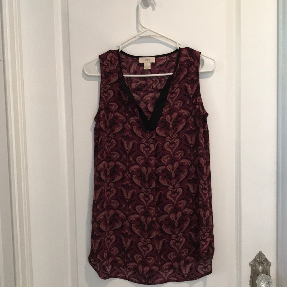 Short sleeve sheer top.
